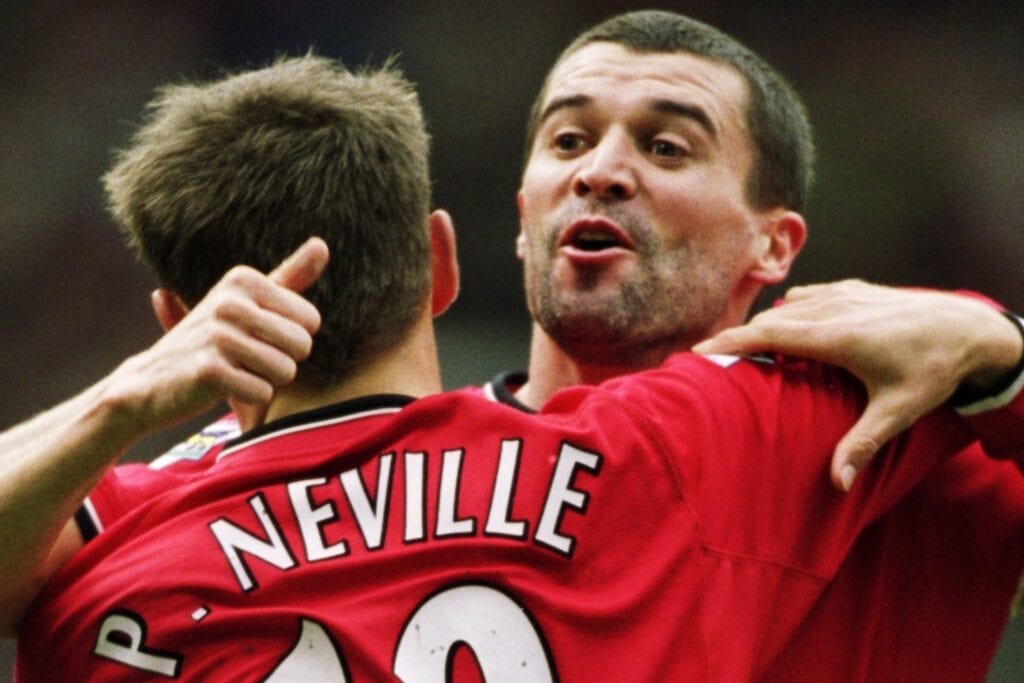 Phil Neville and Roy Keane