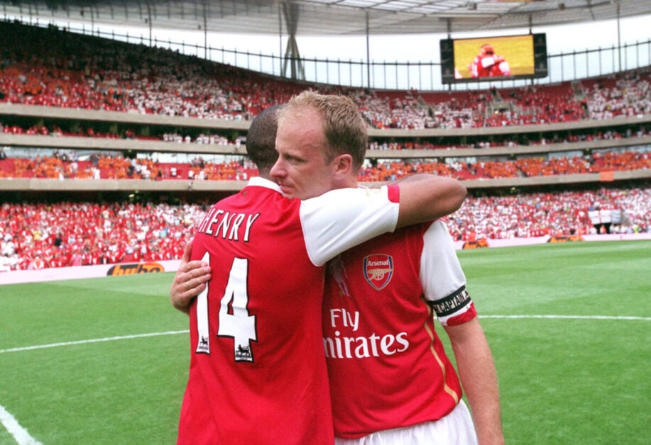 Dennis Bergkamp hugs Thierry Henry