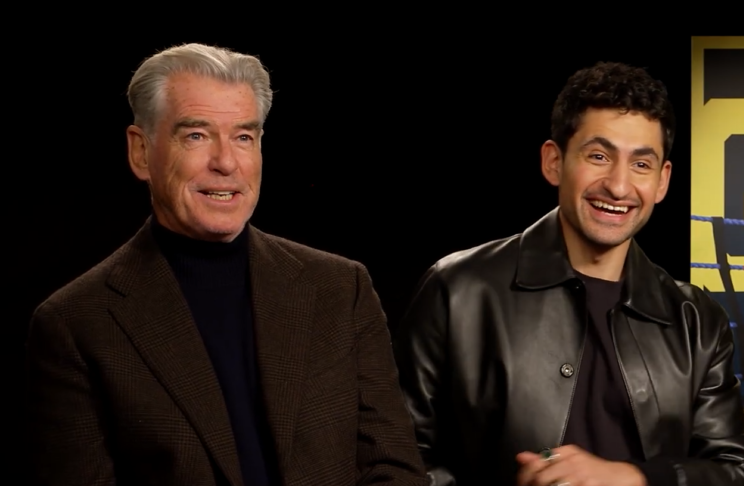 Pierce Brosnan and Amir El-Masry being interviewed