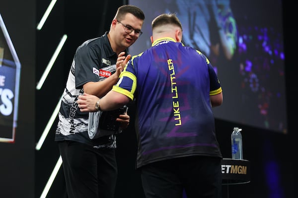 Gian van Veen and Luke Littler after their clash at Premier League Darts Manchester
