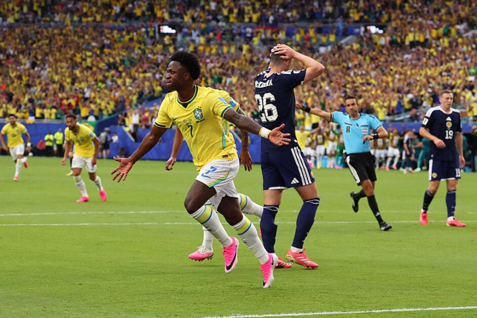 Scott McKenna reacts to Vinicius Junior scoring for Brazil against Scotland