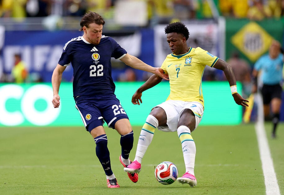 Vinicius Junior challenged by Nathan Patterson during Scotland vs Brazil at FIFA World Cup 2026
