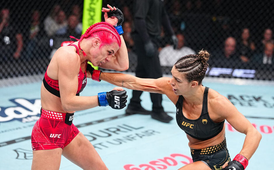 Mackenzie Dern punching Gillian Robertson at UFC 330